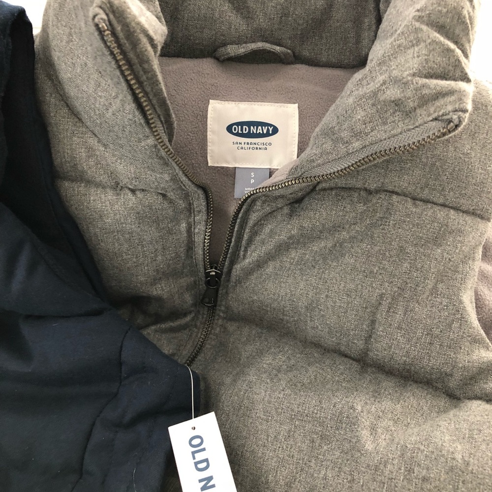 Two fleece lining Old Navy vests.